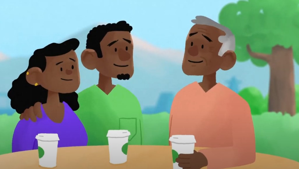 Image of a family having coffee together outdoors